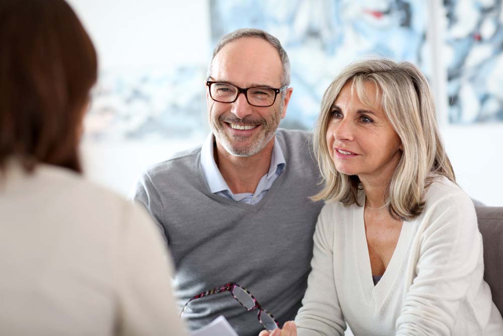 Senior couple meeting financial adviser for investment | Shutterstock #165450731 ESB Professional